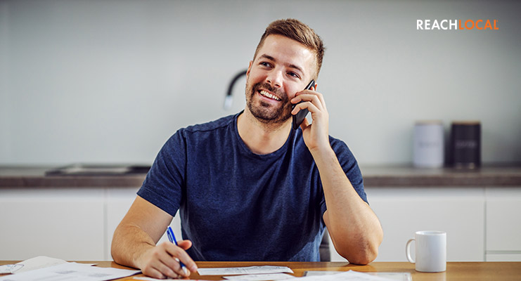 ReachLocal Affiliate Partner speaks to happy client on the phone