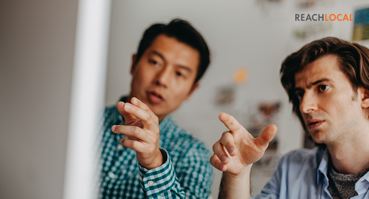 seo analyst works with business owner to update website
